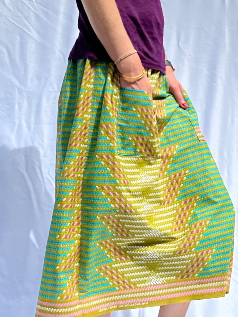 Green brick elastic waist midi skirt African print model is walking